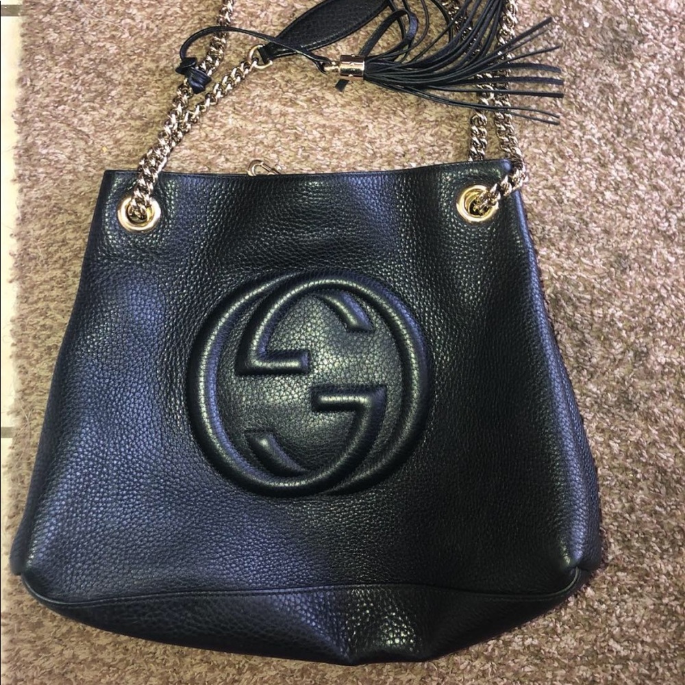 Gucci leather bag , gold chain tassels